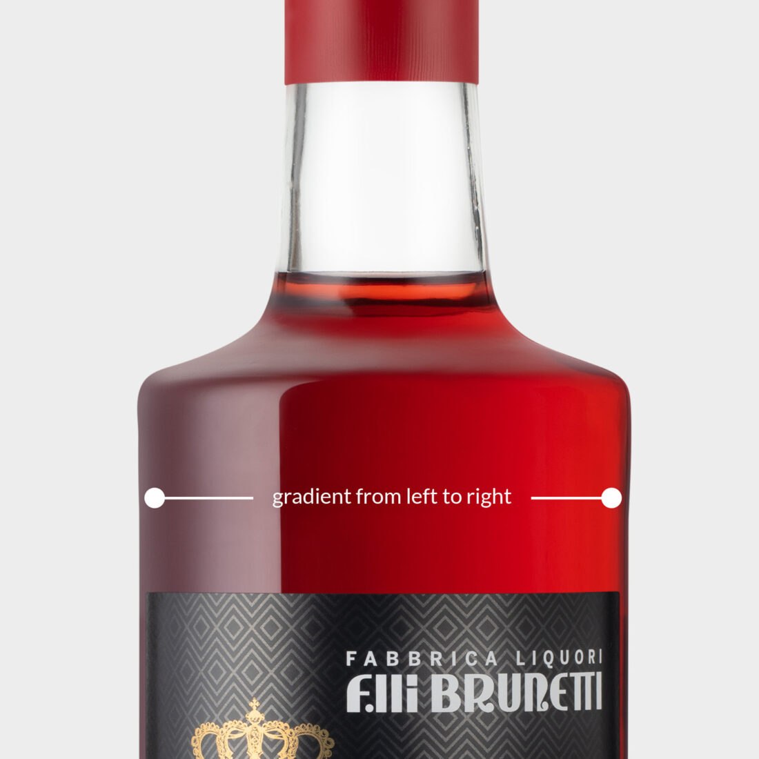 Detail of Brunetti liqueur bottle with light gradient, photographed in Bassano del Grappa by Inlet Studio.