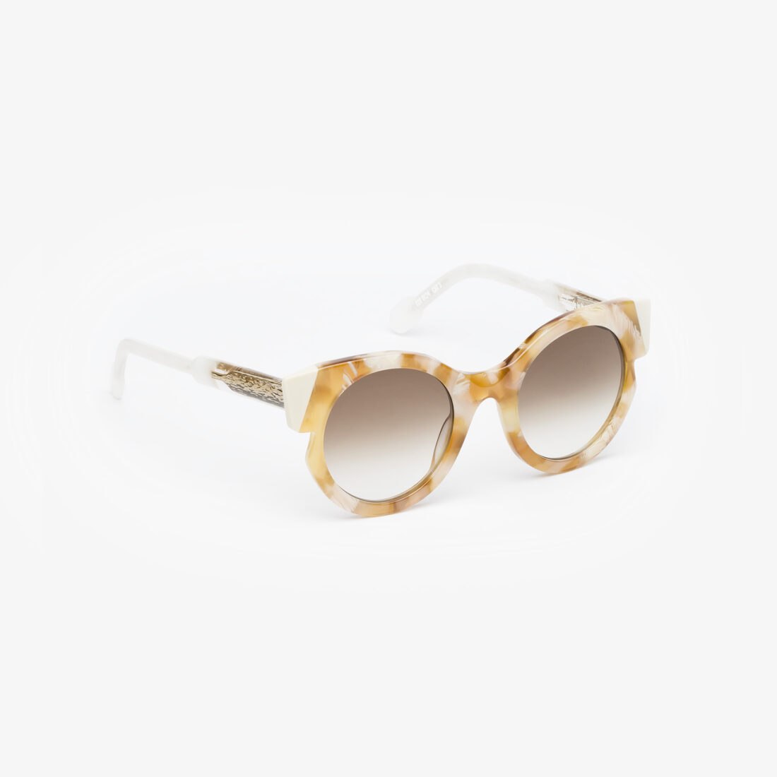 Portrait Eyewear round sunglasses with light tortoiseshell frame, professionally photographed in Italy by Inlet Studio.