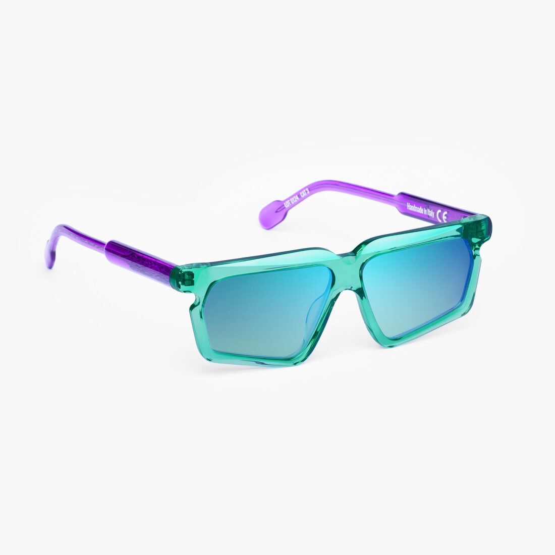 Portrait Eyewear sunglasses with transparent green frame and purple temples, three-quarter view, professional photography by Inlet Studio in Italy.