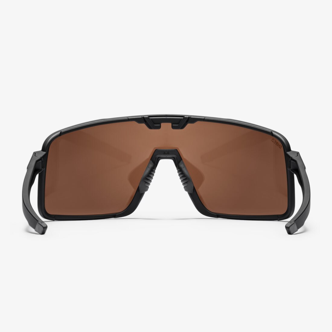 Back view of Shred sport sunglasses with bronze mirrored lens, professional product photography by Inlet Studio, Italy.
